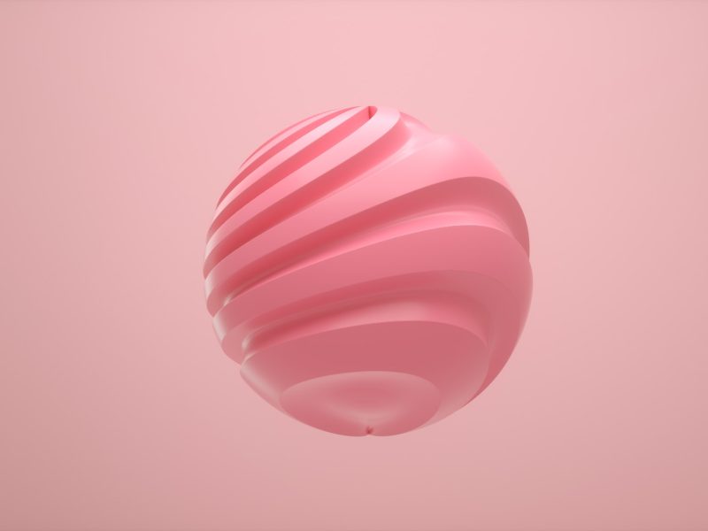 Pastel colored sphere with twisted lines on an isolated background. Minimalist design